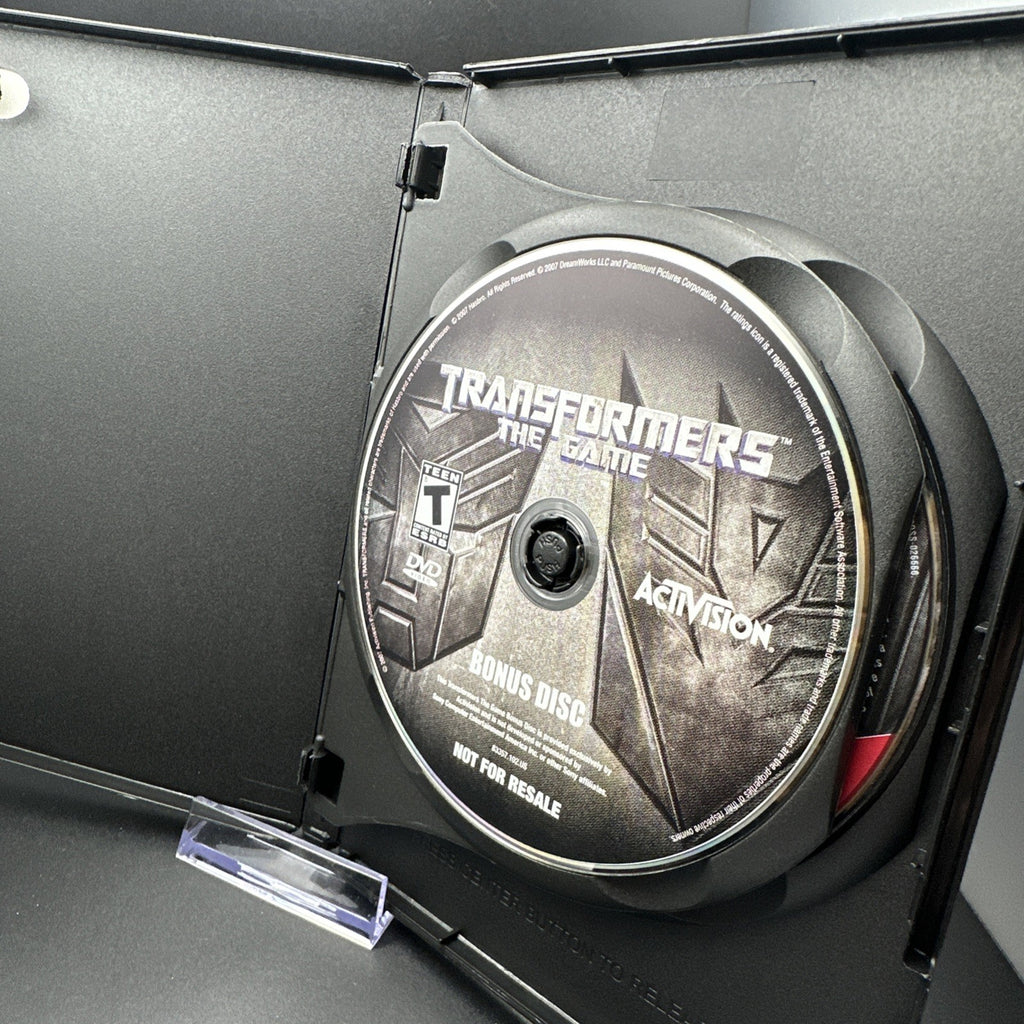 Transformers: The Game (Sony PlayStation 2, 2007) PS2 + Bonus Disc