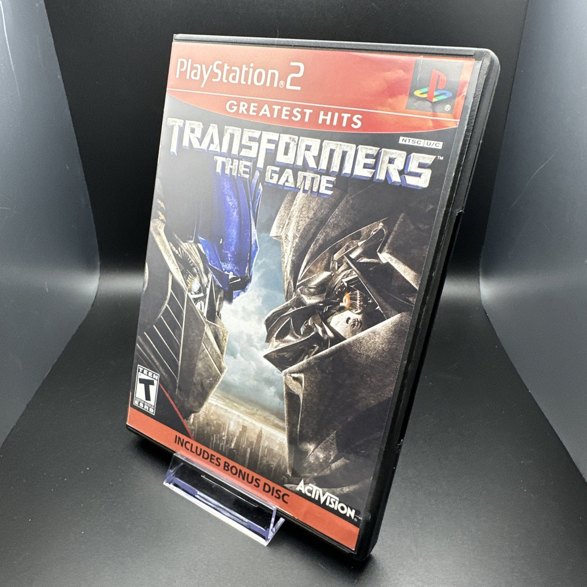 Transformers: The Game (Sony PlayStation 2, 2007) PS2 + Bonus Disc